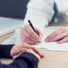 midsection-man-working-table